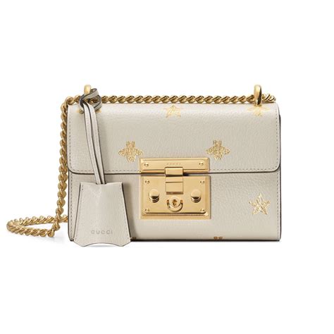 gucci bee star leather pouch|white Gucci bag.